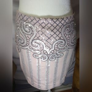 Express form fitting above the knee, skirt. Size S. NWT